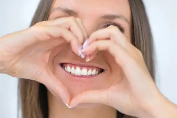 Woman happy with white smile after Blue Light Teeth Whitening Havant